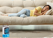 Woman resting on a large couch